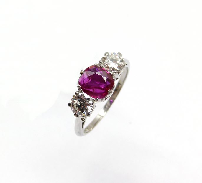 Ruby and diamond three stone ring centred by a 1.00ct cushion shaped Burma ruby | MasterArt